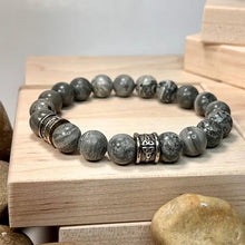 Load image into Gallery viewer, Grey Mapstone Jasper Bracelet with Trinity Knot 10mm (Unisex)