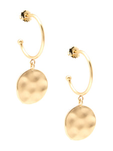 Matte metal hoop earrings with a hammered medallion charm drop