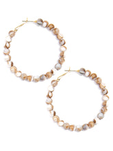 Load image into Gallery viewer, Hoop earrings embellished with glossy, resin marbled beads.
